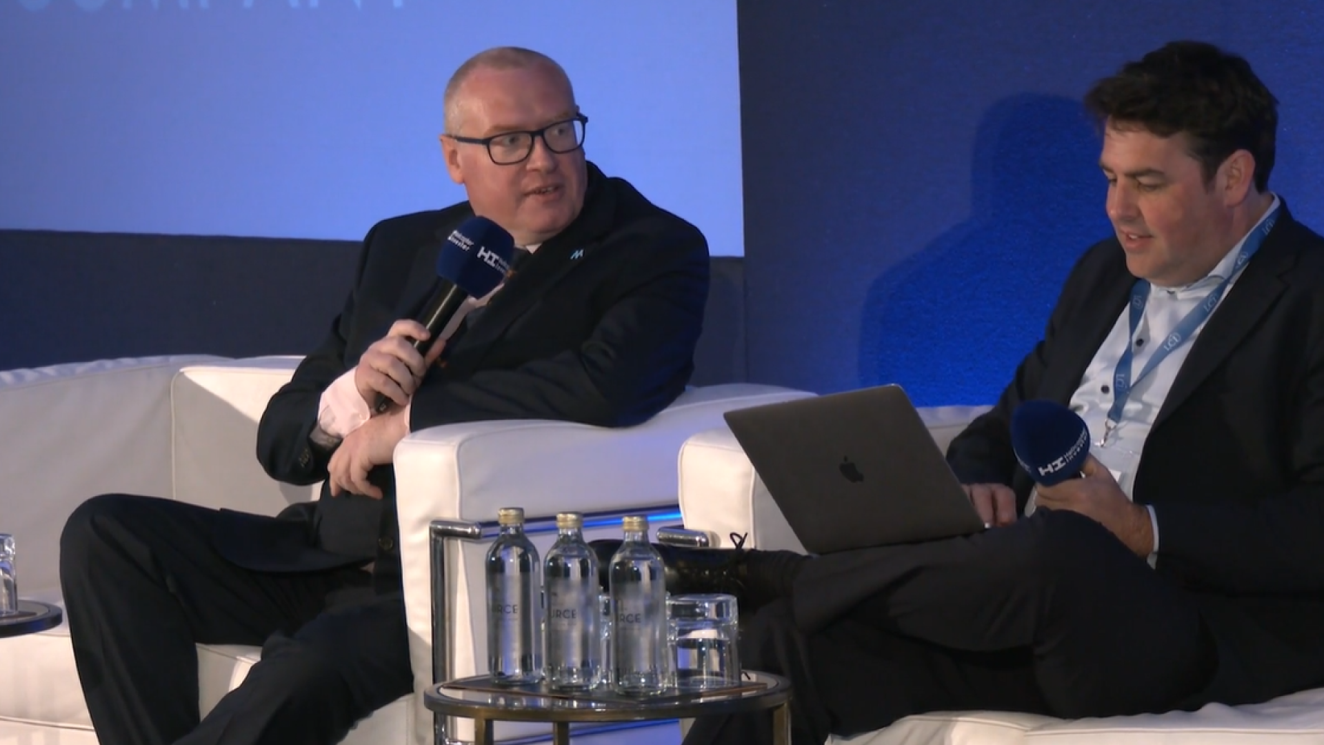 Pat Sheedy, President & CEO of Milestone on stage at Helicopter Investor